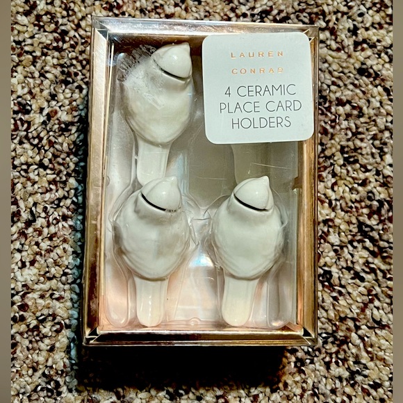 Lauren Conrad Set of 4 White
Ceramic Doves Place Card Holders
Table Setting - Picture 1 of 1